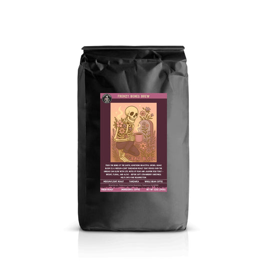 Grave Bloom coffee- medium roast from tanzania. Bag with bright floral skeleton artwork and soft hues